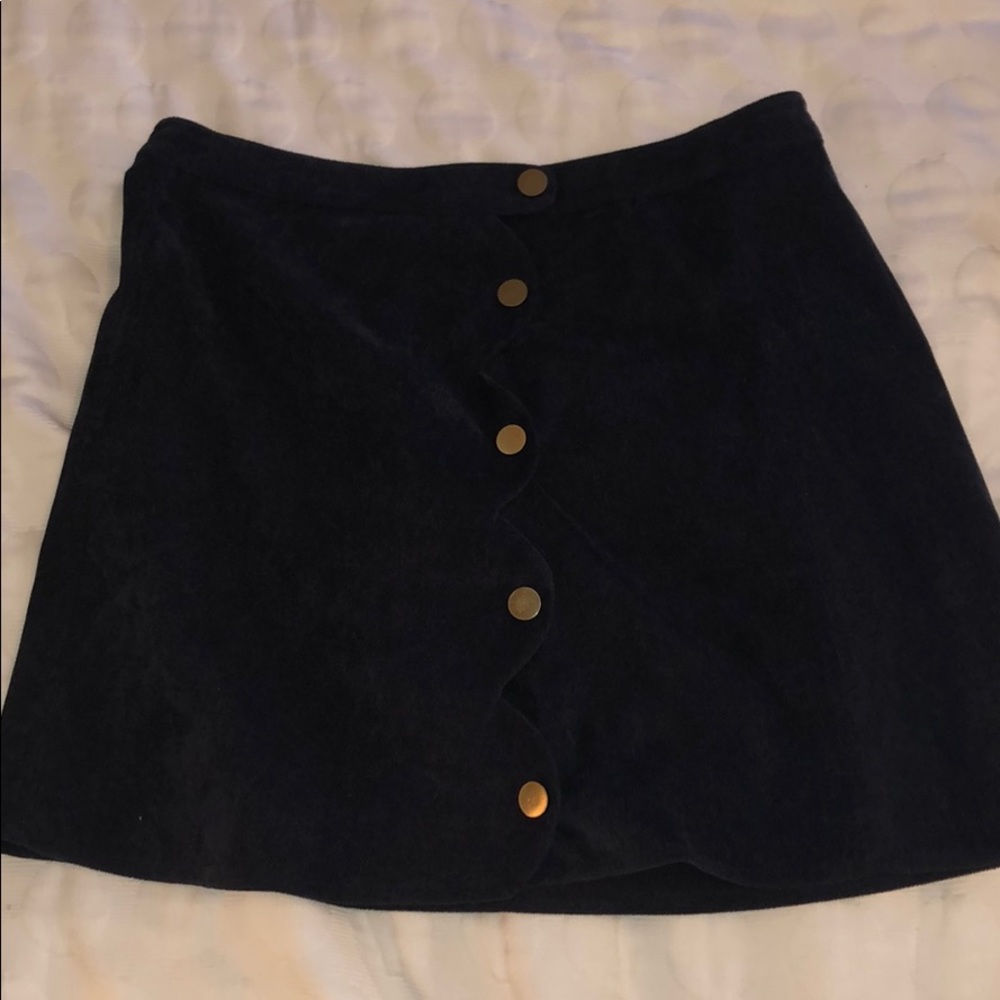 Navy button down skirt with gold buttons.